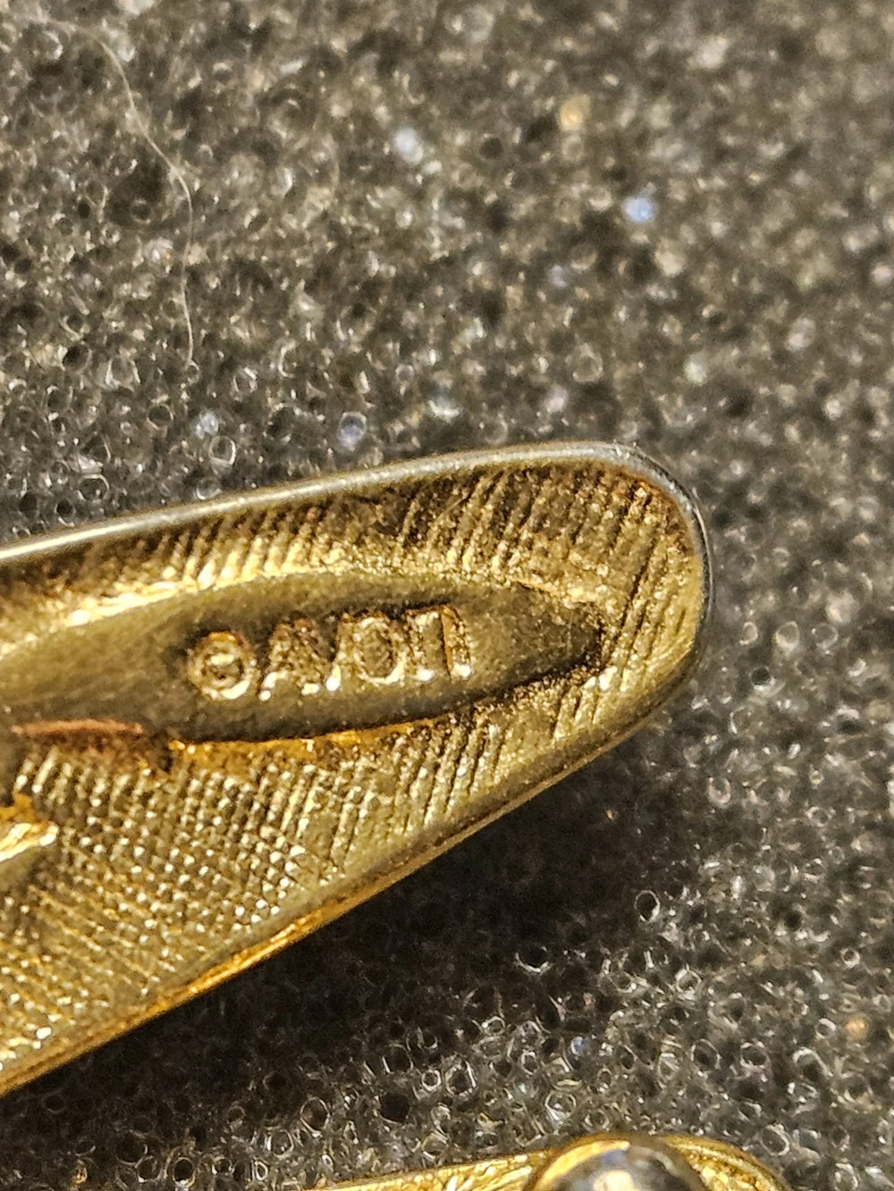 Avon Gold-Tone 'M' Brooch with Clear Rhinestones